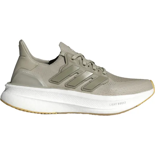Adidas Ultraboost 5 Damen - grau - Erlebe unvergleichlichen Komfort mit dem adidas Ultraboost Laufschuh. Perfekt für Lauftraining und Alltag, bietet er optimale Dämpfung und Stabilität für ein angenehmes Laufgefühl.