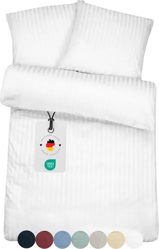 Weiße Damast Bettwäsche 155x220 mit Streifen aus 100% Baumwolle - Elegante Damast Bettwäsche in klassischem Streifendesign, aus 100% Baumwolle. Mit Reißverschluss und waschbar bis 60 Grad. Verleihen Sie Ihrem Schlafzimmer einen Hauch von Luxus und Stil.