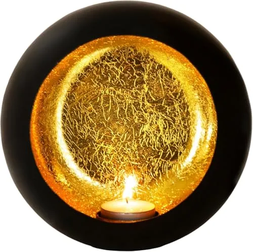 Teelichthalter Schwarz Gold – Stilvolles Windlicht für Gemütlichkeit - Teelichthalter aus edlem Metall, ideal zum Aufhängen. Schafft eine romantische Atmosphäre und verzaubert jeden Raum mit goldenem Lichtschein. Maße: ⌀ 19cm x 10cm.
