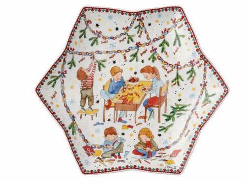 Hutschenreuther Sammelkollektion 2024 Weihnachtsleuchten Sternschale 24cm - Nussknacker: Detailreiche Weihnachtsmotive und feine Goldakzente machen diese 24 cm Sternschale zum perfekten Accessoire für Ihre festliche Tischdekoration.