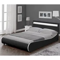 LED Polsterbett 'Valencia' 140x200cm - Schwarz mit weißer Kante - Modernes Kunstlederbett mit extra gepolstertem Kopfteil und RGB LED Beleuchtung, ideal für stilvolle Schlafzimmer.