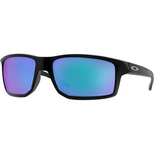 Oakley Gibston Matte Black / Prizm Sapphire Polarized - Sportbrillen mit vollem Schutz und modernem Design, ausgestattet mit Prizm-Gläsern für verbesserte Sicht und optimalen Tragekomfort dank Three-Point-Fit-System.