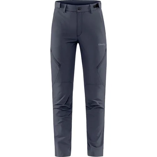 Craft ADV Explore TECH Pants Damen - 4-Wege-Stretch Outdoorhose - Wanderhosen für Damen mit optimaler Bewegungsfreiheit, verstellbarem Bund und vorgeformten Knien für perfekten Tragekomfort bei Outdoor-Abenteuern.