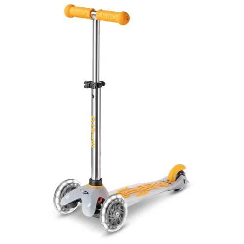 Scooter Mini MICRO DELUXE FLUX LED gelb - MMD202 - Der Mini Micro Deluxe FLUX Tretroller für Kinder mit leuchtenden LED-Rädern bietet Spaß und Sicherheit beim Fahren. Ideal für kleine Abenteurer!