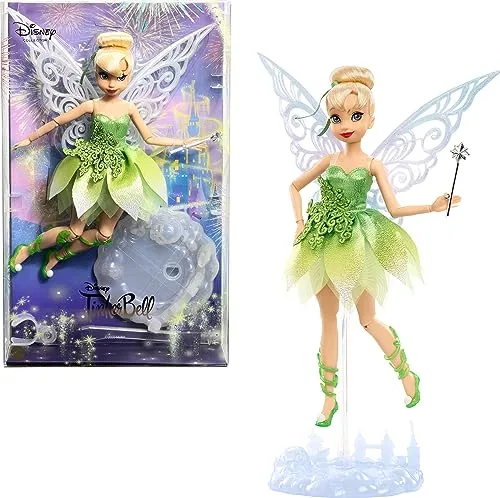 Mattel Disney Tinker Bell Sammelpuppe zum 100. Geburtstag - Puppen – Feiern Sie Disney's 100. Geburtstag mit dieser detailreichen Tinker Bell-Sammelpuppe, die bewegliche Flügel und funkelnde Details bietet, ideal für Spiel und Ausstellung.