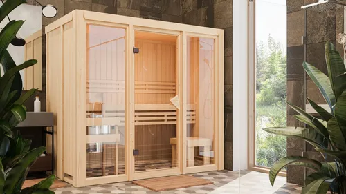 Karibu Sauna Alani 2 - 216 x 122 cm, 68 mm Wandstärke - Die Karibu Sauna Alani 2 bietet mit 68 mm Wandstärke hervorragende Energieeffizienz. Das kompakte Design und die zwei Sichtseiten machen sie ideal für entspannende Momente. Inkl. Ofenschutzgitter für sicheren Einsatz.