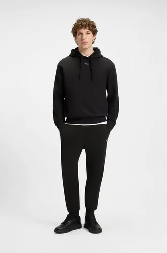 HUGO Herren Tracksuit DapoDayote - Stylischer Relaxed-Fit Trainingsanzug aus Baumwolle mit Logo-Prints, ideal für Streetwear-Looks und Komfort im Alltag.