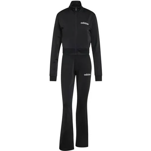 ADIDAS Damen Sportanzug Glam - Stilvoll und Bequem - Erlebe den perfekten Mix aus Stil und Komfort mit dem Glam Trainingsanzug. Strapazierfähiges Trikotmaterial und ein schmaler Schnitt sorgen für eine schmeichelhafte Silhouette – ideal für Sport und Freizeit.