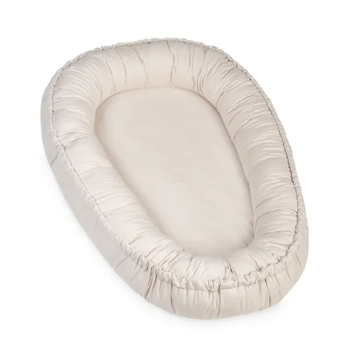 Julius Zöllner Kuschelnest NIDO Jersey uni oatmeal - Kuschelnest aus hochwertigem Jersey, ideal für gemütliche Stunden. Perfekt für die Baby-Pflege und das Wohlbefinden Ihres Kindes.