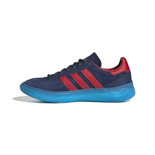 Adidas Hb Spezial Pro Herren - blauer Handballschuh mit Boost - Indoorschuhe mit Obermaterial aus Wildleder und Leder, ausgestattet mit bequemer Boost Zwischensohle und Traxion Außensohle für optimalen Grip und Komfort bei jedem Spiel.