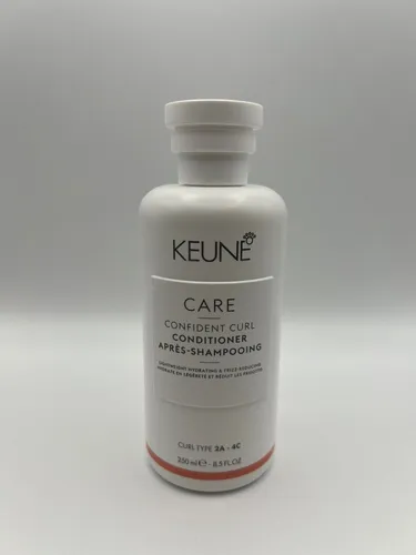 Keune Care Confident Curl Conditioner 250ml - Hochwertige Spülung für lockiges Haar, enthält Provitamin B5 für einfaches Entwirren und Styling. Ideal für Damen und Unisex, 250 ml.