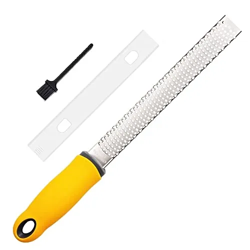 Edelstahl Zester Reibe für Zitrusfrüchte und Käse - Multifunktionale Zester-Reibe aus hochwertigem Edelstahl, ideal zum Reiben von Zitrusfrüchten, Parmesan und Gemüse. Langlebig, leicht zu reinigen und platzsparend – perfekt für jede Küche!