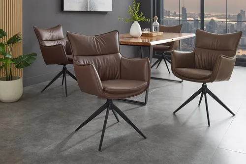riess-ambiente Drehstuhl VOGUE brandy braun/schwarz – 360° drehbar, moderner Polsterstuhl für Ess- und Arbeitszimmer - Der stilvolle Drehstuhl VOGUE vereint elegantes Design mit hohem Komfort. Mit Kunstlederbezug in brandy braun und einem stabilen Metallgestell ist er ideal für moderne Einrichtungsstile und bietet maximale Bewegungsfreiheit.