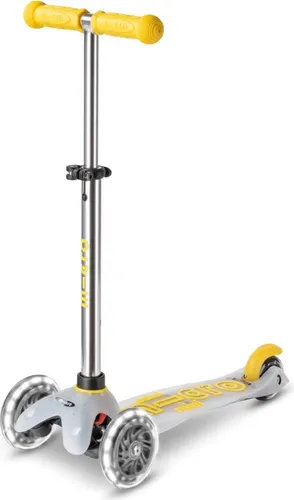 Mini Micro DELUXE Kinderroller FLUX LED neon yellow - Roller für Kinder 2-5 Jahre mit coolen LED-Rädern für optimale Sichtbarkeit und Spaß. Fördert Gleichgewicht und motorische Fähigkeiten durch den patentierten Lean-to-Steer-Mechanismus.