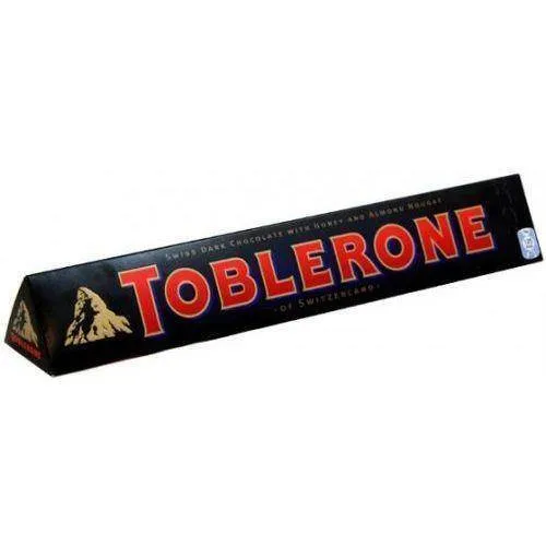 Toblerone Dunkel 100 g - Genießen Sie die einzigartige Kombination aus dunkler Schokolade und köstlichen Aromen in der klassischen Toblerone-Form. Ideal für Schokoladenliebhaber!