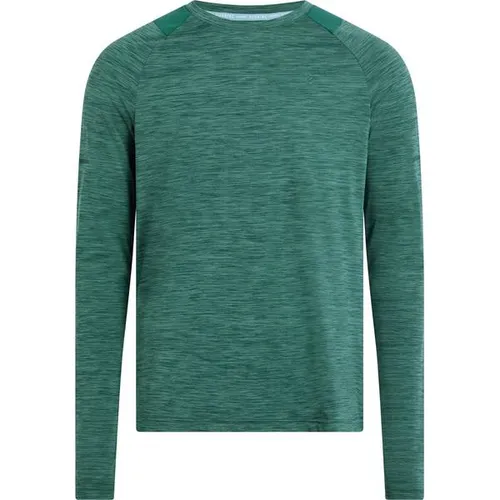 ENERGETICS Herren Langarmshirt Ailo LS M – Komfort für Läufer - Das langärmelige Laufshirt Ailo von ENERGETICS mit Daumenöffnungen und atmungsaktiven Mesheinsätzen bietet optimalen Tragekomfort. Mit DRY PLUS-Technologie und reflektierenden Elementen bist du bestens ausgestattet für deine Läufe.