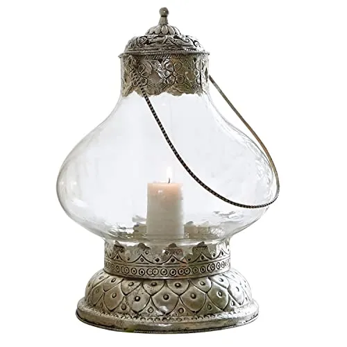 Loberon Laterne Kaela - Laterne im orientalischen Stil, kunstvoll verziert mit langem, dekorativem Griff, ideal für Stumpenkerzen und perfekt für den Outdoor-Bereich.