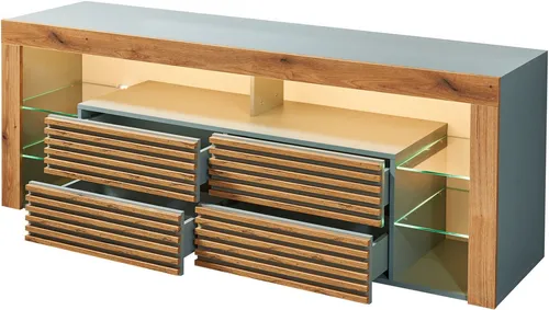 Goal 2 TV-Lowboard mit LED-Beleuchtung in Salbei - Stylisches TV-Lowboard in Salbei und Evoke Eiche Optik mit viel Stauraum. Die LED-Beleuchtung schafft eine einladende Atmosphäre, während die grifflose Gestaltung modern und elegant wirkt. Maße: 179 x 67 x 44 cm (B/H/T).