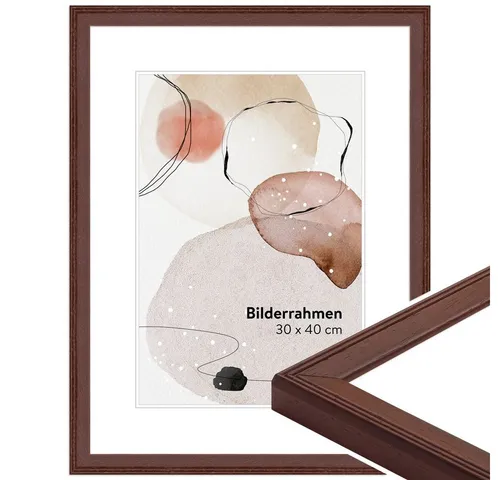 WANDStyle Bilderrahmen H320, Nussbaum-Optik aus Massivholz - Klassischer Bilderrahmen in Nussbaum-Optik für Formate bis 30x40 cm. Hergestellt aus nachhaltigem Holz in Deutschland, vereint er Qualität mit stilvollem Design. Ideal für die Wandmontage.