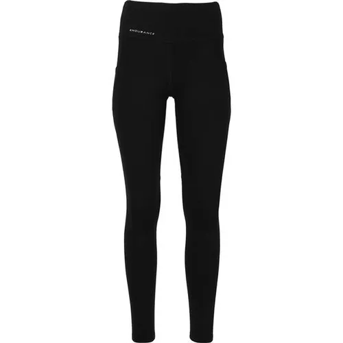 ENDURANCE TATHER W Damen Tights mit Taschen - Leistungsstarke Damen Tights von ENDURANCE mit innovativer QUICK DRY-Technologie. Atmungsaktiv, schnell trocknend und mit praktischen Taschen für Handy und Schlüssel – ideal für jedes Workout!