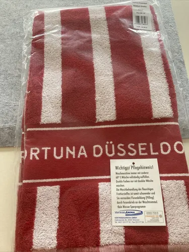 Fortuna Düsseldorf Badetuch Neu - Fußball-Fanshop: Rotes Badetuch der Fortuna Düsseldorf, perfekt für Fans der 2. Bundesliga und ideal für den Strand oder das Schwimmbad.