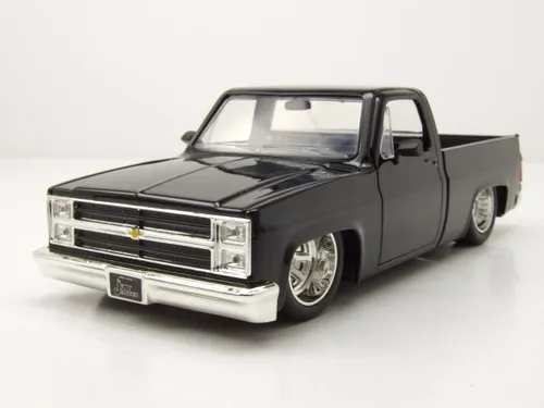 Chevrolet C-10 Pick Up 1985 schwarz mit Minilite Felgen - Modellauto 1:24 von Jada Toy, detailgetreu mit öffnenden Hauben und Türen, ideal für Sammler und Fans von klassischen Pickup Trucks.