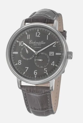 Eichmüller Automatikuhr RE7024 – Elegante Herrenuhr mit grauem Zifferblatt & Lederband - Die Eichmüller RE7024 Automatikuhr kombiniert klassisches Design mit modernem Komfort. Mit 42 mm Gehäuse und zuverlässigem Automatikwerk ist sie die perfekte Wahl für stilbewusste Herren, die mechanische Präzision schätzen.