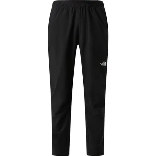 THE NORTH FACE Herren Sporthose M MOUNTAIN ATHLETICS USHBA PANTS - Die Mountain Athletics Ushba Jogginghose bietet mit feuchtigkeitsregulierendem FlashDry™ optimalen Komfort für deine Workouts. Das dehnbare Material sorgt für Bewegungsfreiheit, während praktische Reißverschlusstaschen Stauraum bieten.