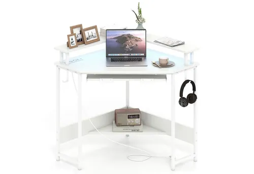 Costway Eckschreibtisch mit Ladestation in Weiß - Platzsparender Eckschreibtisch mit integrierter Ladestation. Ideal für kleine Räume, bietet er 2 Steckdosen und 1 USB-Anschluss für eine ordentliche Arbeitsumgebung.