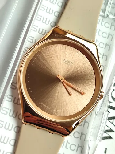 SWATCH+IRONY SKIN+SYXG101 SKINROSEE+NEU/NEW in rosegold von Swatch
