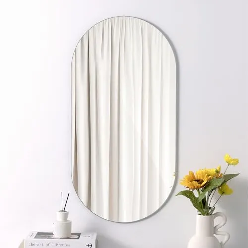Navaris Ungerahmter Ovaler Spiegel - Moderner Wandspiegel für Flur und Wohnzimmer - Dekorative Wandspiegel: Dieser hochwertige, rahmenlose ovale Spiegel bietet vielseitige Anbringungsmöglichkeiten und fügt sich perfekt in jedes moderne Interieur ein.