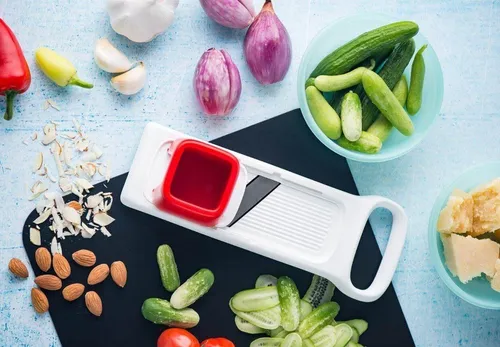 Produktbild Tupperware Mini Speedy-Mando Gemüsehobel