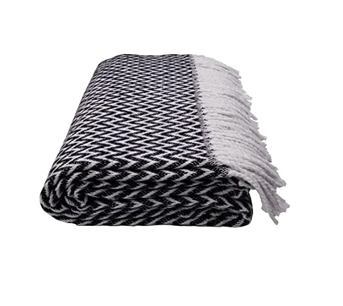 GLAESER Wohndecke Fair Deluxe Cotton All Seasons | Wolldecke aus 50% Baumwolle, 30% Polyester, 20% Acryl | Couchdecke/Sofadecke | Kuscheldecke | Wolldecke mit Fransenborde (Schwarz/Weiß Wellenmuster)