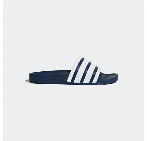 adidas Unisex Adilette Slipper - Bequeme Dusch-Badeschuhe in Blau, 38 EU - Dusch- & Badeschuhe für Herren mit weichem Cloudfoam Fußbett für optimalen Komfort und griffiger Laufsohle für sicheren Halt.