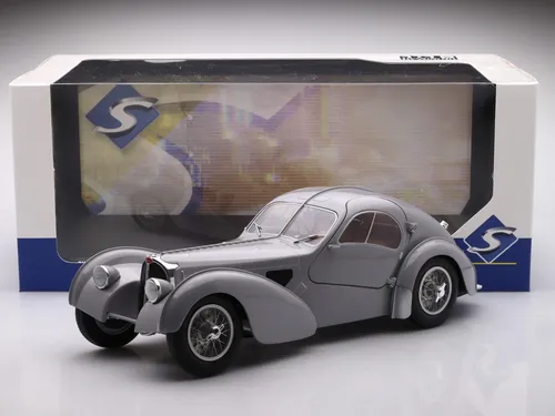 Bugatti Type 57 SC Atlantic 1937 grau Modellauto 1:18 Solido - Detailgetreues 1:18 Modellauto des Bugatti Oldtimers in Grau, mit funktionierenden Türen und hochwertigem Die-Cast-Material. Ideal für Sammler und Liebhaber.