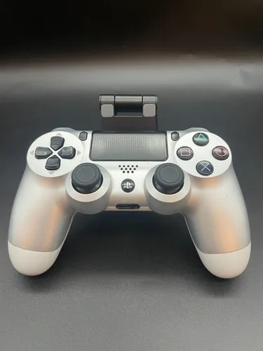 Sony PlayStation DualShock 4 Kabellos Controller - Silber - Controller für Sony PlayStation 4 mit ergonomischem Design und integriertem Trackpad für verbessertes Gameplay. Kabellos mit einer Funkreichweite von bis zu 10 m.