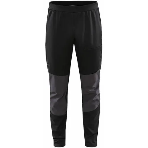 CRAFT Herren Hose ADV BACKCOUNTRY HYBRID PANTS M - Langlaufhosen aus wind- und wasserdichtem 3-Lagen-Material, mit hohem Tragekomfort durch gebürstetes Innenmaterial und optimaler Belüftung dank Mesh-Einsätzen.
