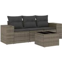 vidaXL 4-tlg. Garten-Sofagarnitur mit Kissen Grau Poly Rattan - Gartenmöbel für stilvolle Entspannung im Freien. Diese modulare Sofagarnitur bietet langlebiges PE-Rattan und bequeme, abnehmbare Kissenbezüge für einfachen Komfort und Pflege.