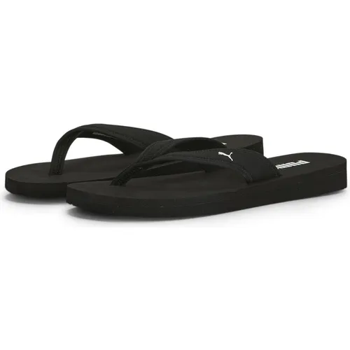 Puma Sandy Flip Flip-Flops für Damen - Leichte Sandy Flip-Flops mit Neopren-Riemen und EVA-Fußbett, ideal für Strand und Wassersport. Stilvolles PUMA Design und optimalen Tragekomfort.