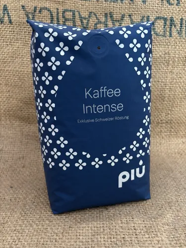 più caffè Schümli Royal Kaffeebohnen 1 kg - Geröstete Kaffeebohnen, kräftig und intensiv durch indonesische Robusta-Bohnen, ideal für Vollautomaten und Siebträgermaschinen, traditionell in der Schweiz geröstet.
