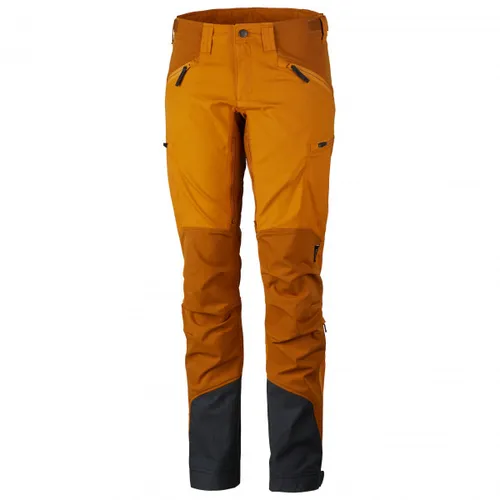 Lundhags Makke Pant Women Größe 42 Gold/Dark Gold - Wanderhose mit verstärkten Innenseiten aus Schoeller Keprotec, ideal für anspruchsvolle Outdoor-Aktivitäten mit optimaler Belüftung und verstellbarem Beinabschluss.