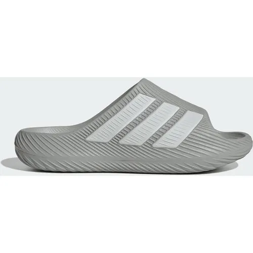 ADIDAS PURECHILL SLIDES - Genieße höchsten Komfort mit den adidas Purechill Slides. Diese Badeschlappen kombinieren lässigen Style mit funktionaler Climacool Technologie, die für kühlende Frische sorgt. Ideal für Freizeit und Stadtbummel.