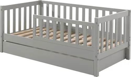 Juniorbett Karie 70x140 cm aus Massivholz und MDF in Grau - Modernes Juniorbett Karie für Kinder von 3-6 Jahren. Mit praktischer Bettschublade und umlaufendem Rausfallschutz. Ideal für zusätzlichen Stauraum und sicheren Schlaf.