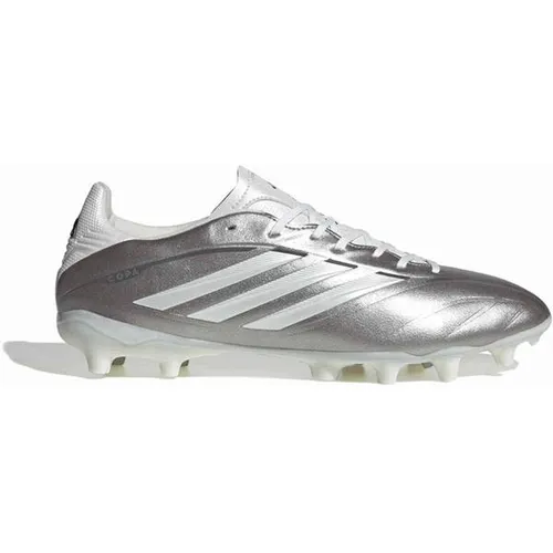 ADIDAS Herren Fußball-Rasenschuhe COPA PURE IV LEAGUE FG - Die COPA Pure IV League Fußballschuhe vereinen Tradition und Innovation. Optimale Passform und FUSIONFEEL Technologie sorgen für hohen Komfort und erstklassigen Grip auf Rasen. Ideal für stilvolle Spieler, die Eleganz und Leistung schätzen.