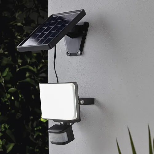 MeLiTec LED Solar Außenstrahler SO39-1 mit Bewegungsmelder, Schwarz - Vielseitiger LED Solar Außenstrahler mit Bewegungsmelder für Sicherheit im Außenbereich. Flexibel installierbar dank separatem Solarmodul und justierbarem Bewegungsmelder für optimale Anpassung.