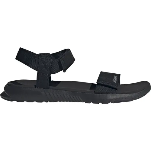 adidas Terrex Hydroterra Light Sandals - Bequeme Wassersandalen für Abenteuer - Wanderschuhe mit atmungsaktivem Design und verstellbaren Klettverschlüssen für optimale Bewegungsfreiheit und Tragekomfort. Ideal für Sommer-Abenteuer!