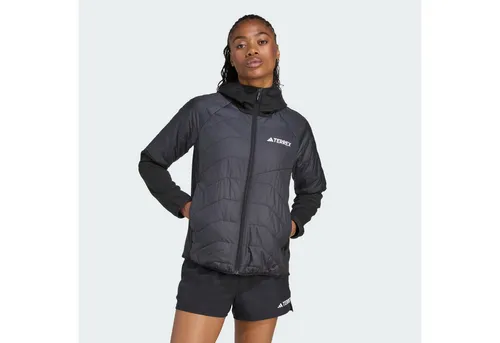 Outdoorjacke ADIDAS TERREX W MULTI HYB JKT - Funktionsjacke für Damen mit CLIMAWARM-Technologie, die Wärme speichert und Feuchtigkeit ableitet – ideal für wechselhafte Wetterbedingungen beim Wandern.