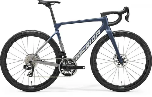 Merida SCULTURA 10K V2 XS SILK BLUE/GRAY - Ultraleichtes Rennrad - Das Merida SCULTURA 10K V2 in XS SILK BLUE/GRAY ist ein ultraleichtes Rennrad mit modernem Design und sportlicher Geometrie. Ideal für ambitionierte Fahrer, die Wert auf Performance und Agilität legen.