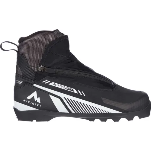 McKinley Active Pro Langlaufschuhe Damen 9,5 - Schwarz - Skischuhe für Damen mit atmungsaktivem Mesh-Obermaterial und griffiger Contagrip® TA Außensohle, ideal für matschiges Gelände und optimale Trittsicherheit.