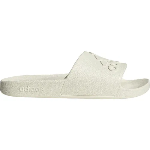 adidas Unisex Adilette Aqua Slides - Off White, 39 EU - Wanderschuhe für Komfort und Stil, mit flacher Sohle und atmungsaktivem Textil-Innenmaterial, ideal für entspannte Tage am Wasser.